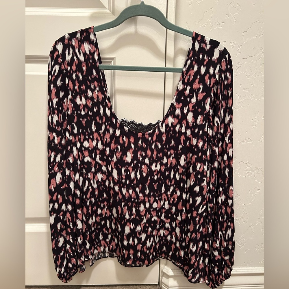 Lovers and Friends top in size large with black , white, and pink.